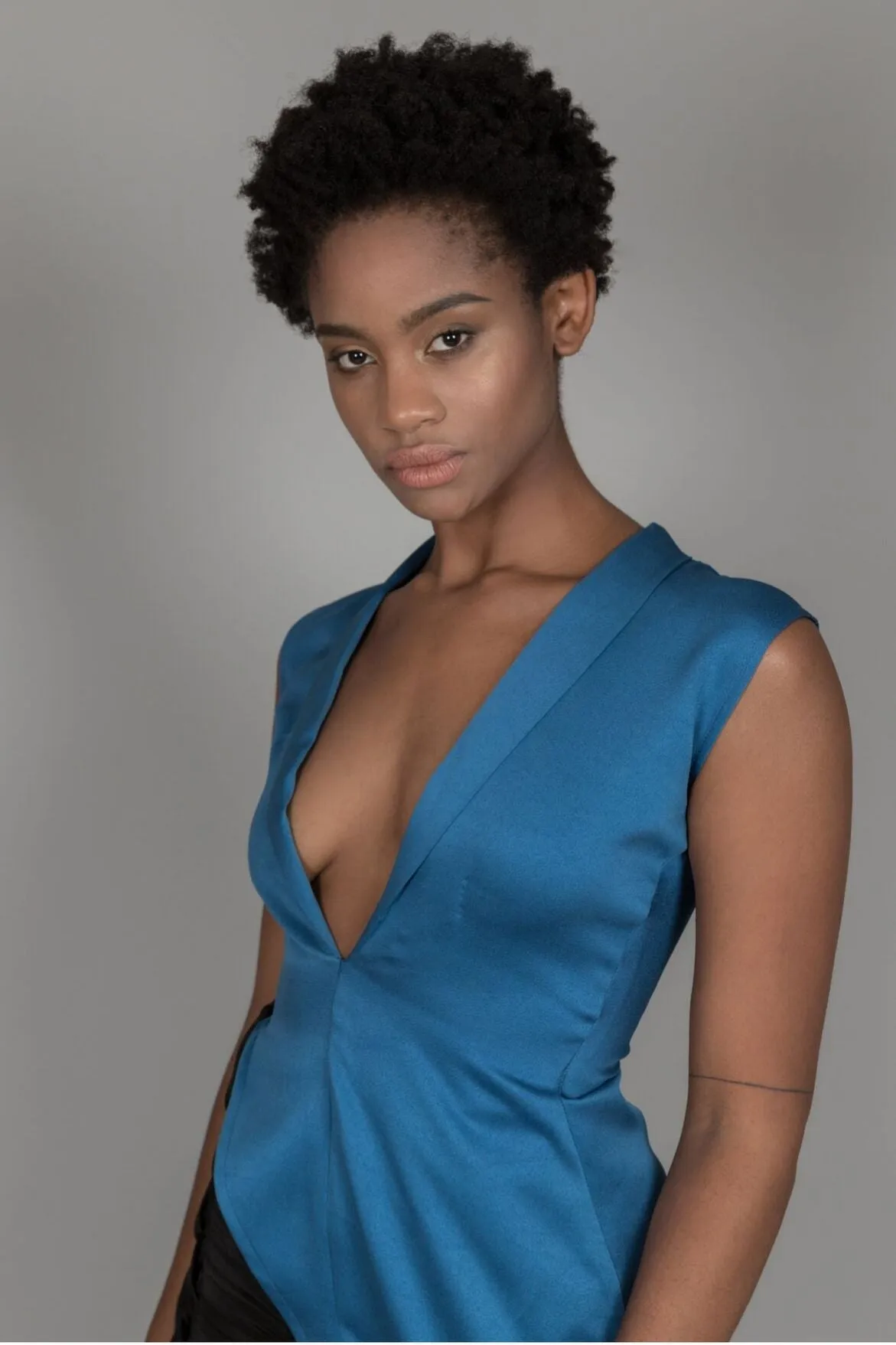 Asymmetric blouse with one piece lapel collar