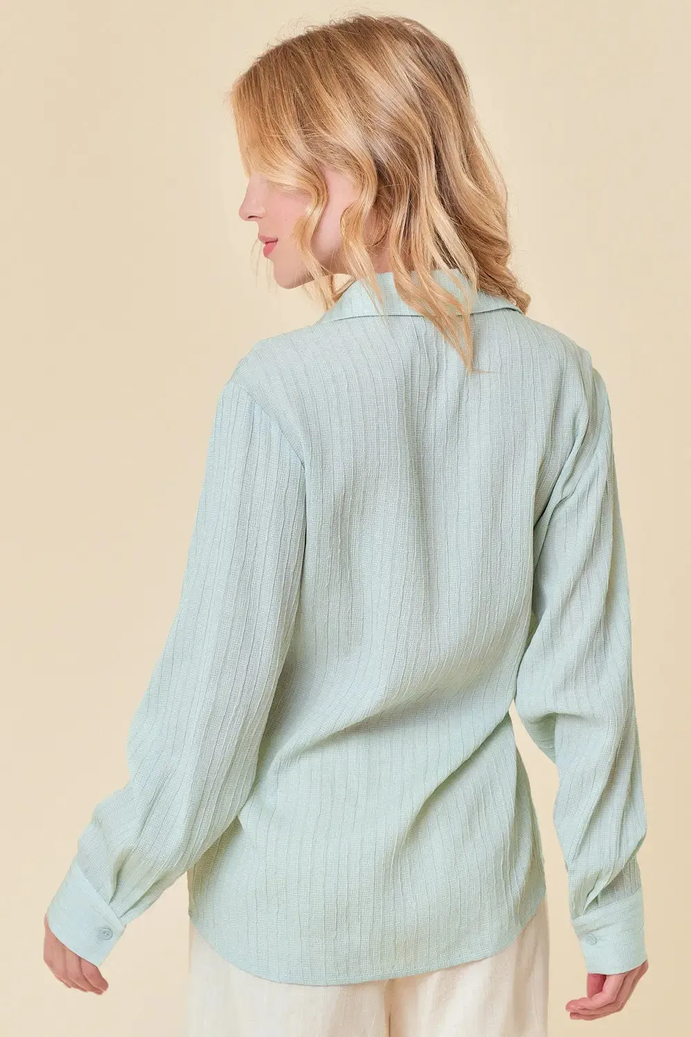 TEXTURED POINT COLLAR WRAP TOP