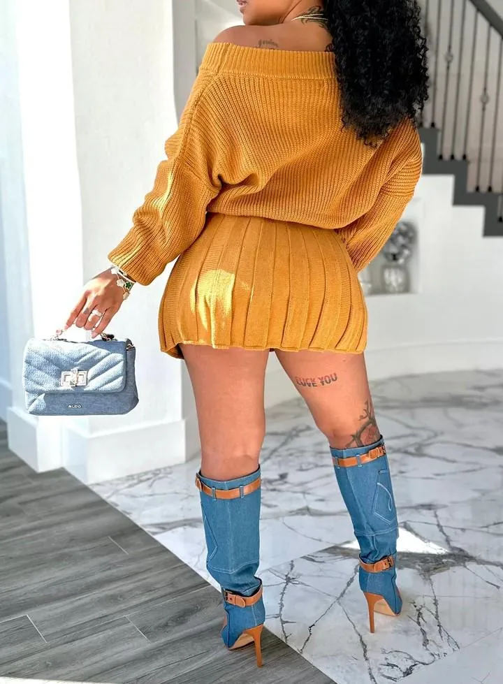 Two-piece set with bateau collar top and pleated skirt